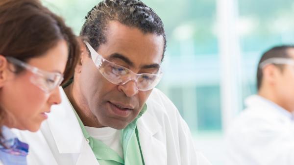 Nurse and doctor discussing together