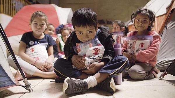Image of children who received care kits from Save The Children in Mexico